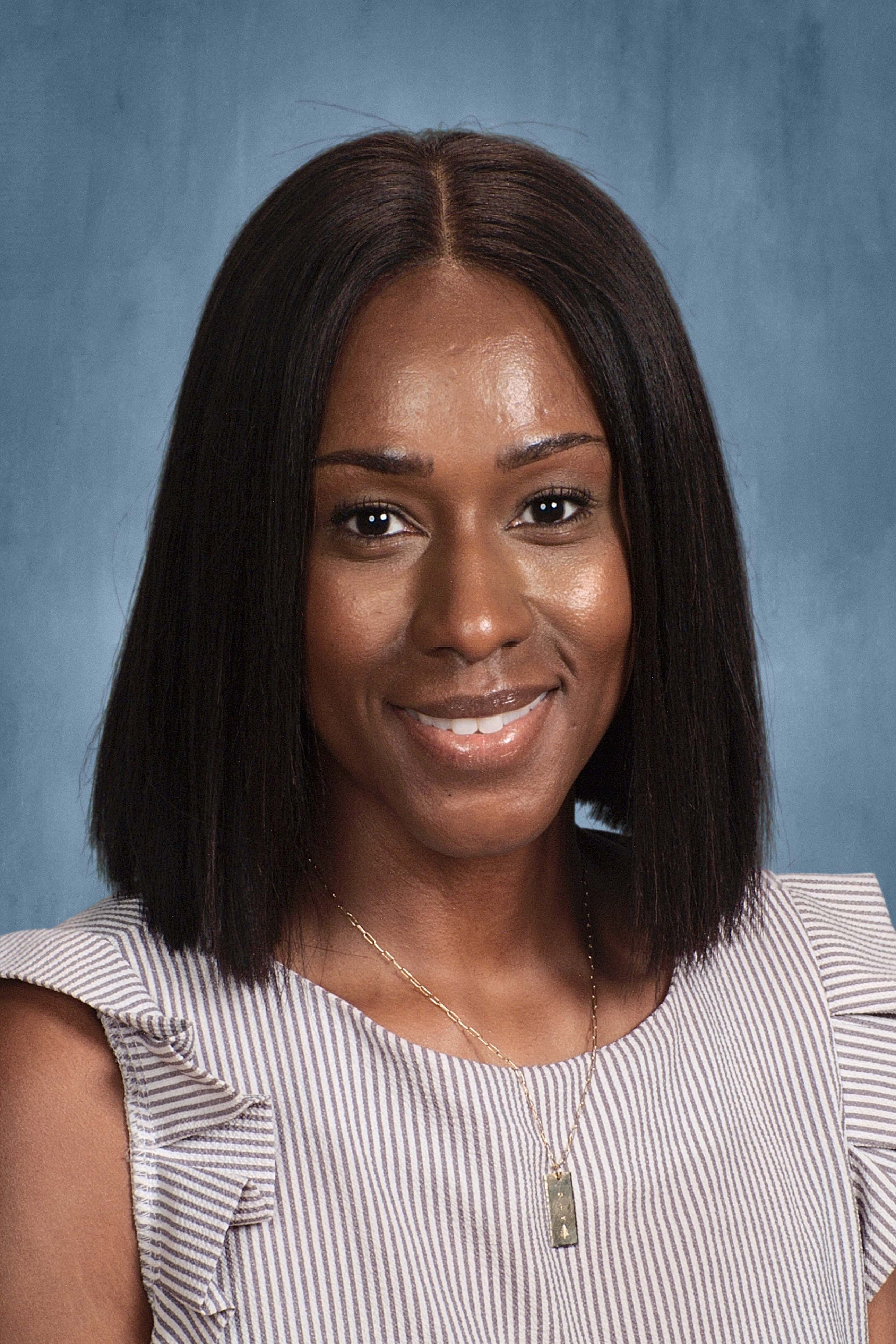 A. Sharp-Simmons, IB Coordinator