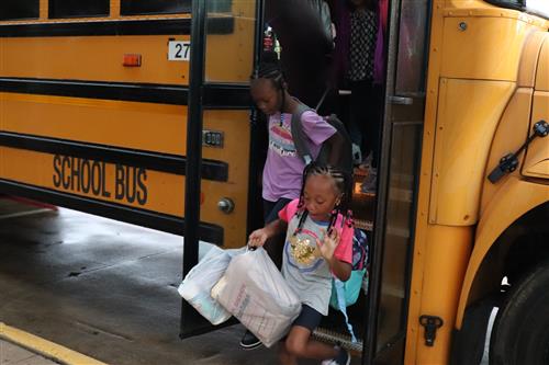 Students exiting bus