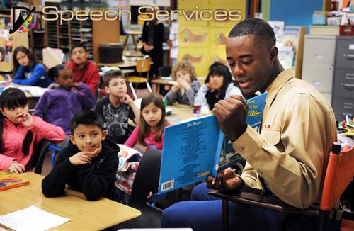 Man reading a book to children 