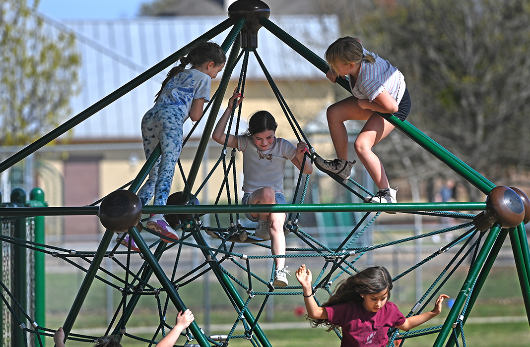 Girls playing on playground