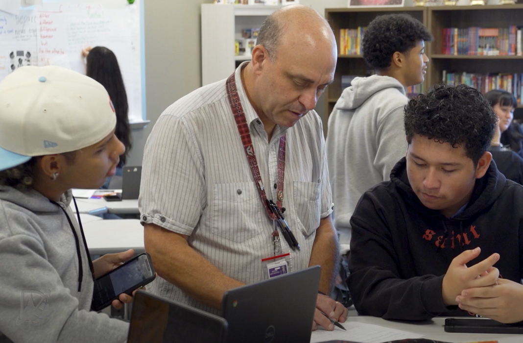 Teacher with students